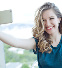 Beautiful woman taking a selfie