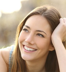 Woman smiling outside