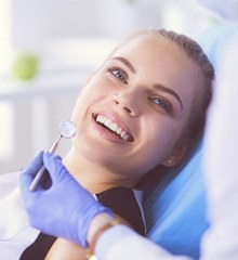 Woman smiling in dental chair