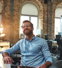 person at work, smiling