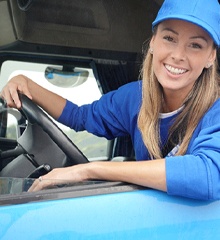 person driving and smiling