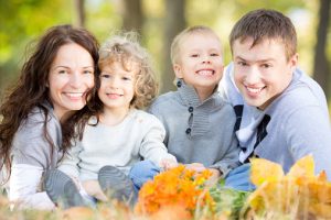 family with beautiful smiles thanks to their trusted family dentist in farmington