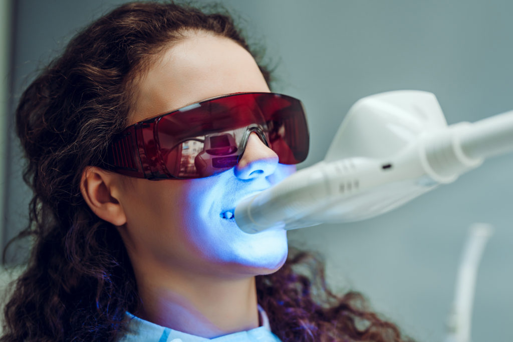 woman undergoing teeth whitening in Farmington